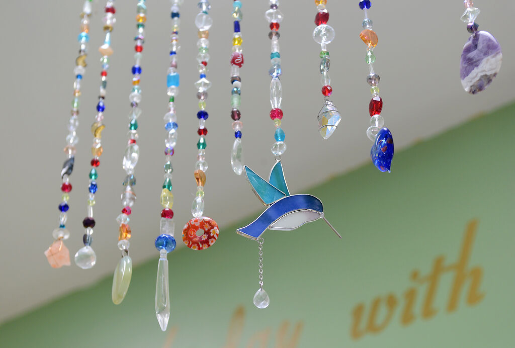 Colorful beads dangle from the ceiling inside
